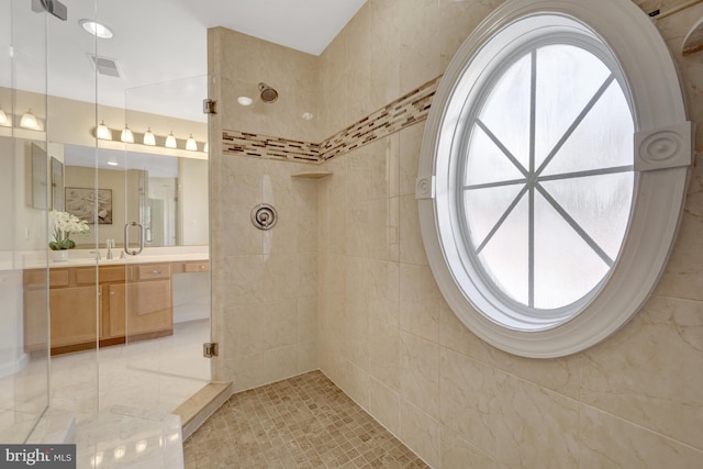 1650 Colonial Hills Dr, Mclean, VA 22102 - bathroom with tiled shower, vanity, and tile patterned flooring