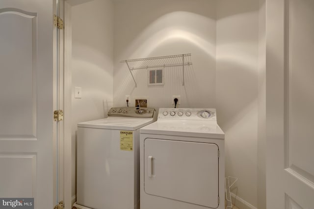 1650 Colonial Hills Dr, Mclean, VA 22102 - laundry area with washing machine and dryer
