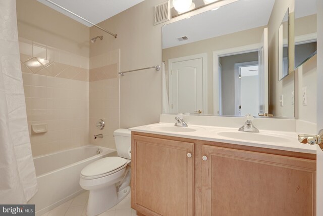 1650 Colonial Hills Dr, Mclean, VA 22102 - full bathroom featuring shower / bath combo with shower curtain, double vanity, and tile patterned floors