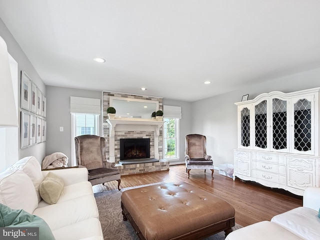 13225 Manor S, Mount Airy, MD 21771 - living area featuring plenty of natural light, wood finished floors, a fireplace, and recessed lighting