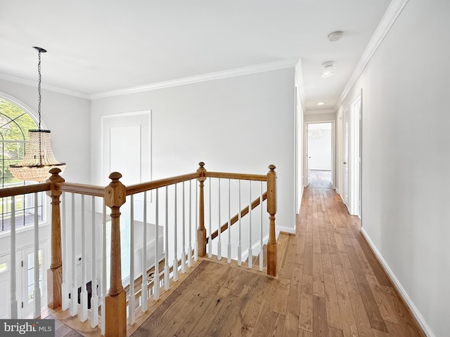 13225 Manor S, Mount Airy, MD 21771 - hall with an upstairs landing, hardwood / wood-style floors, a chandelier, crown molding, and baseboards