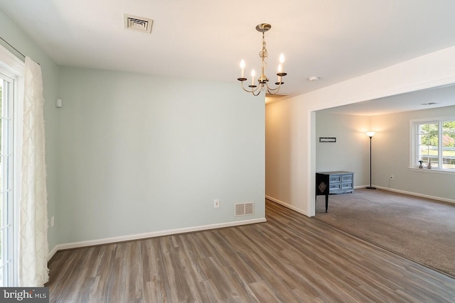 403 S Brynwood Dr, Browns Mills, NJ 08015 - spare room featuring a chandelier, wood finished floors, baseboards, and a smoke detector
