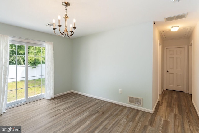 403 S Brynwood Dr, Browns Mills, NJ 08015 - unfurnished room with wood finished floors, baseboards, a chandelier, and attic access
