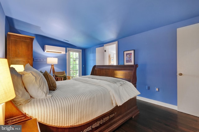 323 N Patrick St, Alexandria, VA 22314 - bedroom with a wall mounted AC, lofted ceiling, wood finished floors, and baseboards