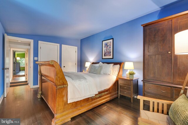 323 N Patrick St, Alexandria, VA 22314 - bedroom featuring dark wood finished floors and baseboards