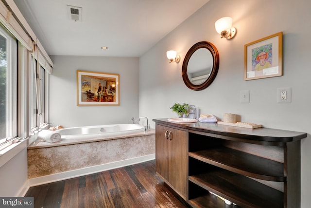 323 N Patrick St, Alexandria, VA 22314 - full bath featuring hardwood / wood-style floors, vanity, a garden tub, baseboards, and recessed lighting