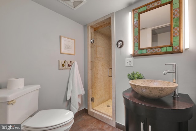 323 N Patrick St, Alexandria, VA 22314 - bathroom with a sink, toilet, baseboards, and a stall shower