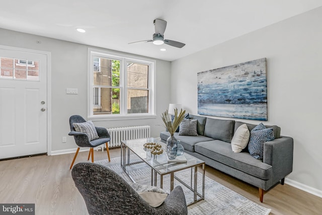 2839 Winton St, Philadelphia, PA 19145 - living area featuring radiator, healthy amount of natural light, light wood-type flooring, and recessed lighting