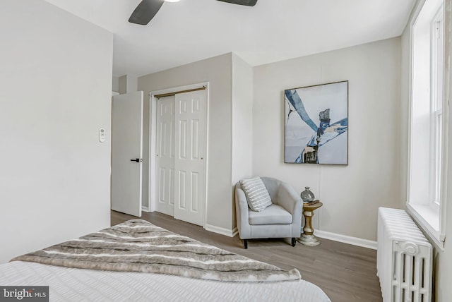 2839 Winton St, Philadelphia, PA 19145 - bedroom featuring radiator heating unit, wood finished floors, baseboards, a closet, and a ceiling fan