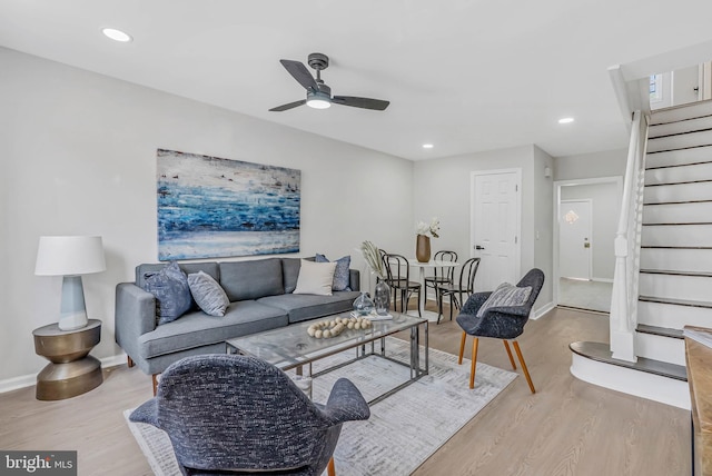 2839 Winton St, Philadelphia, PA 19145 - living room with stairway, a ceiling fan, wood finished floors, baseboards, and recessed lighting