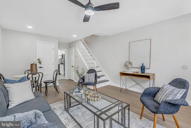 2839 Winton St, Philadelphia, PA 19145 - living room featuring stairs, a ceiling fan, wood finished floors, recessed lighting, and baseboards