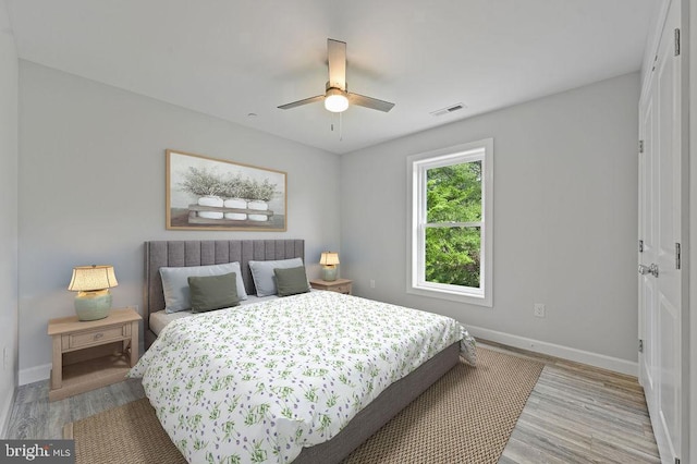 3376 Jefferson Pond Rd, Federalsburg, MD 21632 - bedroom with baseboards, wood finished floors, and a ceiling fan