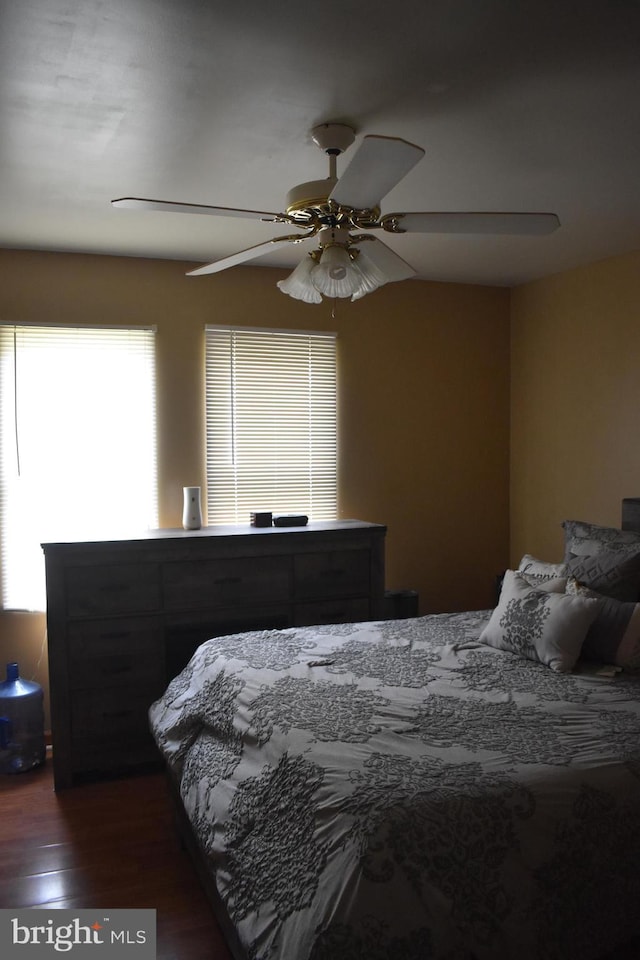 6525 Nomini Hall Rd, Hague, VA 22469 - bedroom with dark wood finished floors and a ceiling fan
