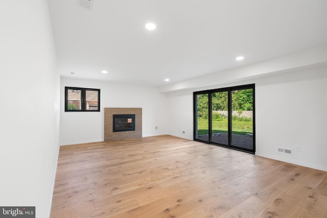 3750 Wheatsheaf Rd, Huntingdon Valley, PA 19006 - unfurnished living room featuring recessed lighting, light wood finished floors, a fireplace, and baseboards