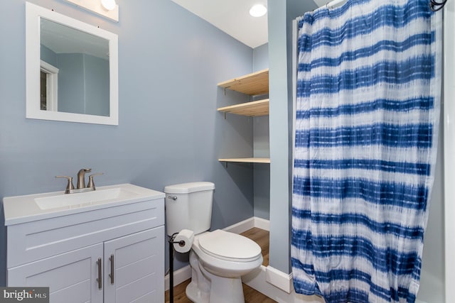168 Joshua Dr, Hanover, PA 17331 - full bathroom with wood finished floors, vanity, and a shower with shower curtain