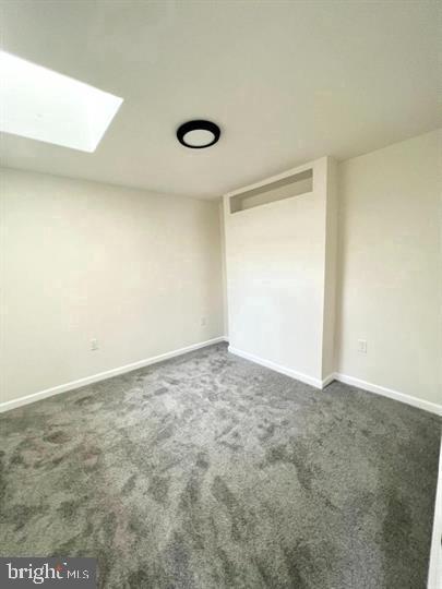 117 Idle Lake Rd, Franklinville, NJ 08322 - unfurnished bedroom featuring carpet flooring, a skylight, and baseboards