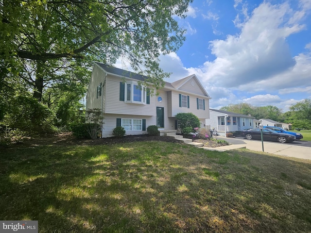 1139 Bradley Rd, Pasadena, MD 21122 - split foyer home featuring a front yard