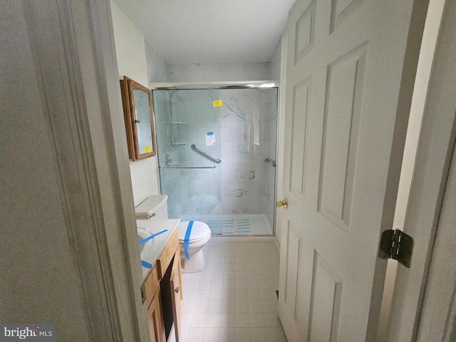 1139 Bradley Rd, Pasadena, MD 21122 - full bath with toilet, a shower stall, vanity, and tile patterned flooring