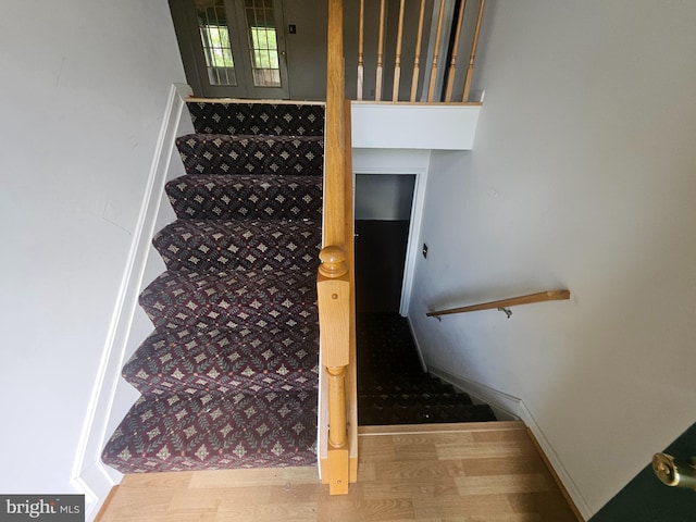 1139 Bradley Rd, Pasadena, MD 21122 - stairs featuring wood finished floors