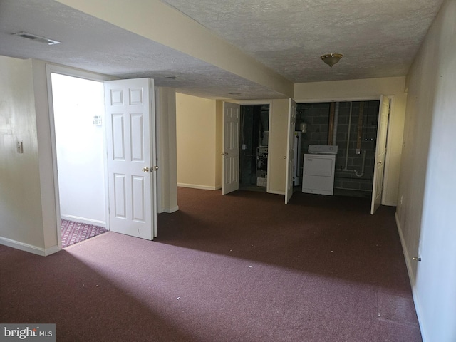 1139 Bradley Rd, Pasadena, MD 21122 - finished below grade area featuring carpet, washer / dryer, baseboards, and a textured ceiling