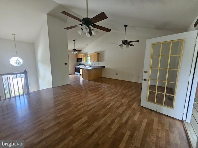 1139 Bradley Rd, Pasadena, MD 21122 - unfurnished living room featuring high vaulted ceiling, wood finished floors, and a ceiling fan