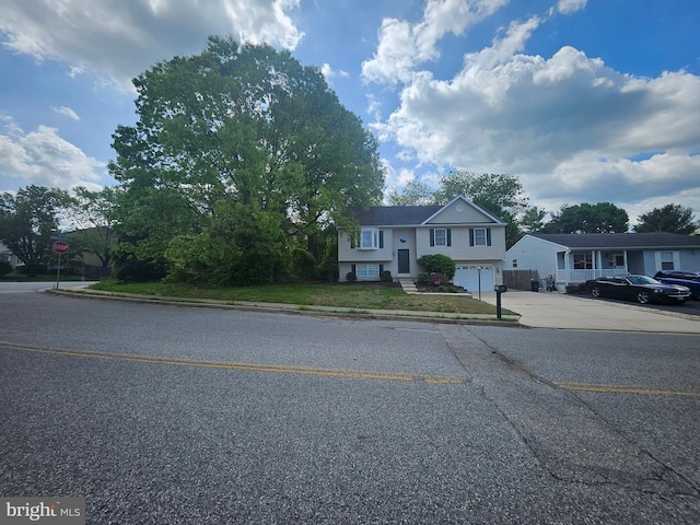 1139 Bradley Rd, Pasadena, MD 21122 - raised ranch with driveway and a garage
