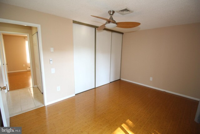 236 Vernon Rd, Monroe Township, NJ 08831 - unfurnished bedroom featuring baseboards, ceiling fan, and wood finished floors