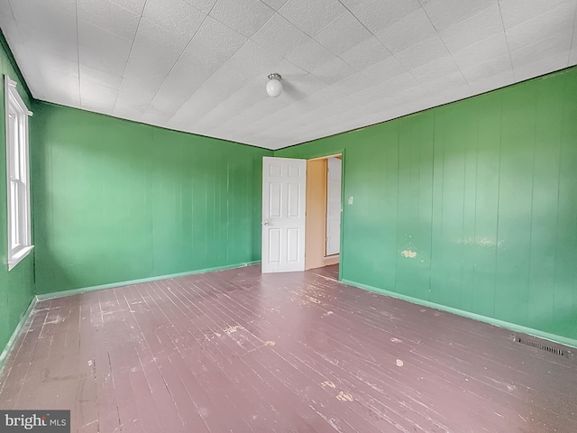 123 W Foundry St, Millville, NJ 08332 - unfurnished room with wood finished floors and baseboards