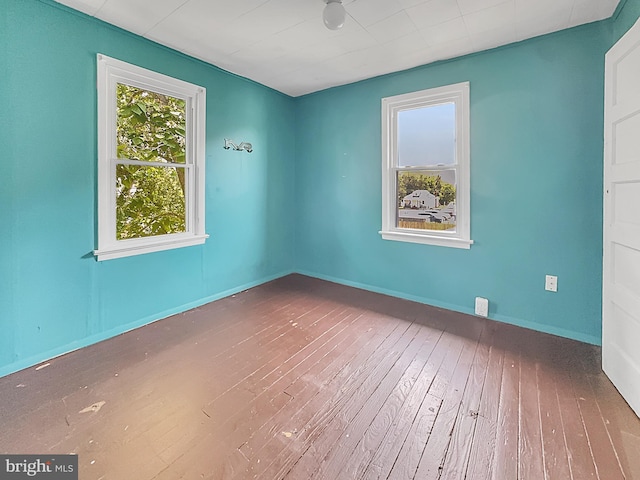 123 W Foundry St, Millville, NJ 08332 - spare room with wood-type flooring and baseboards