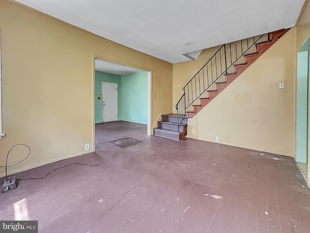 123 W Foundry St, Millville, NJ 08332 - unfurnished living room featuring stairs
