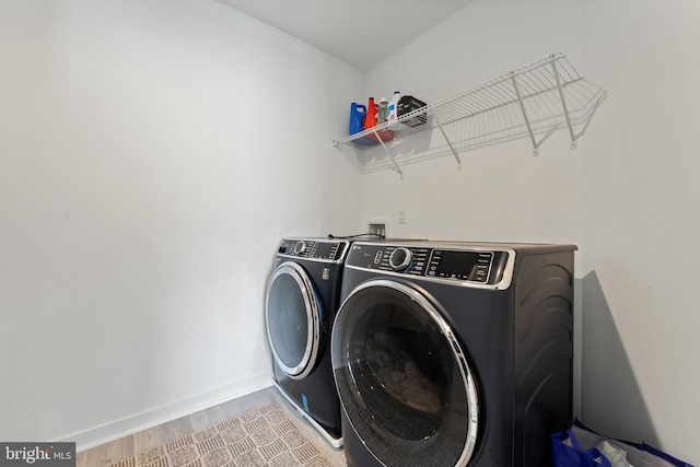 9400 Kinnerton Dr, Midlothian, VA 23112 - laundry area with separate washer and dryer, baseboards, and light wood-type flooring