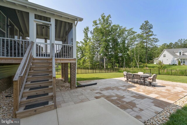 9400 Kinnerton Dr, Midlothian, VA 23112 - view of patio with stairs, a sunroom, and outdoor dining space