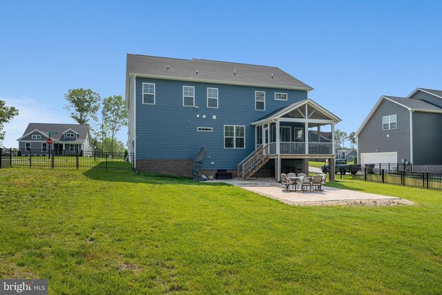 9400 Kinnerton Dr, Midlothian, VA 23112 - rear view of house with a sunroom and a patio