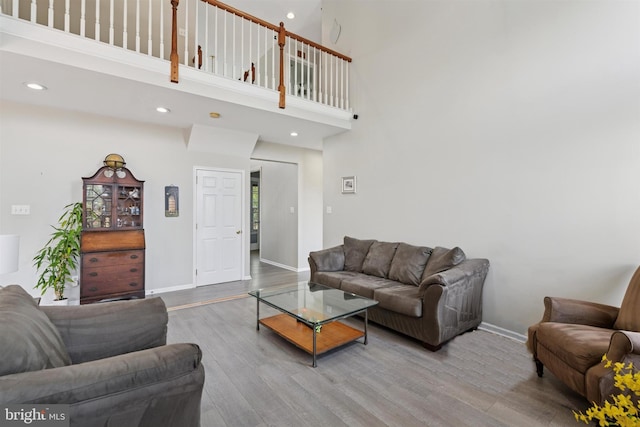 127 Watch Hill Rd, East Fallowfield Township, PA 19320 - living area featuring wood finished floors, recessed lighting, and a towering ceiling