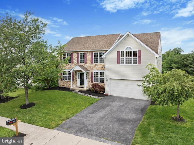 127 Watch Hill Rd, East Fallowfield Township, PA 19320 - view of front of house featuring driveway, an attached garage, a front yard, and roof with shingles