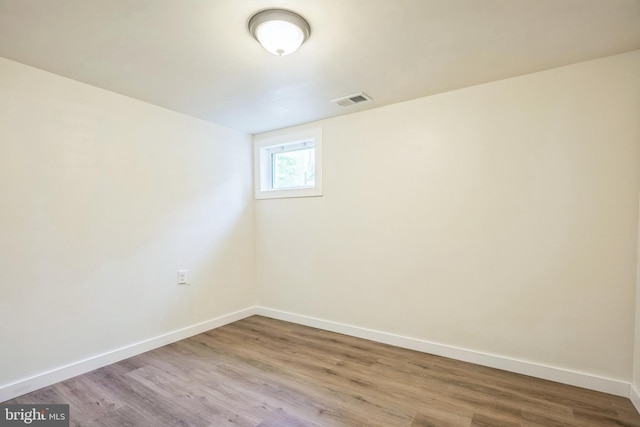 27136 Dogwood Ln, Mechanicsville, MD 20659 - unfurnished room with baseboards and wood finished floors