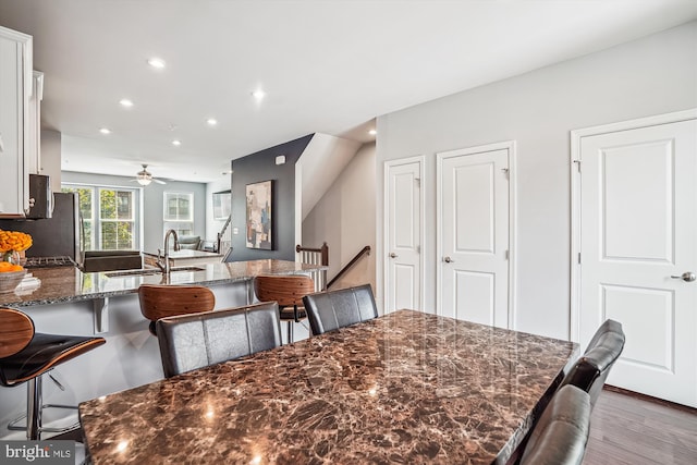 43436 Apple Orchard Sq, Ashburn, VA 20148 - dining area with recessed lighting, ceiling fan, and wood finished floors