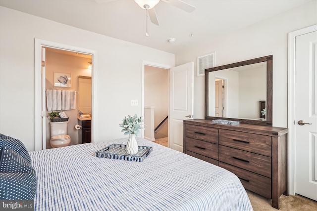 43436 Apple Orchard Sq, Ashburn, VA 20148 - bedroom featuring light carpet, connected bathroom, and a ceiling fan