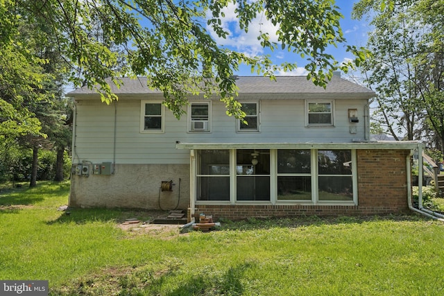 64 Poplar Ave, Warrington, PA 18976 - back of property with a yard and a sunroom