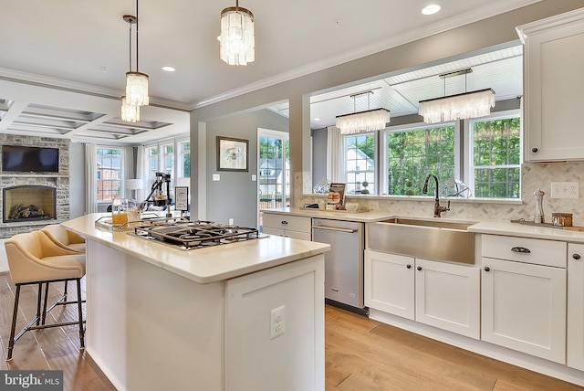 4420 Breidenbaugh Ln, Glen Arm, MD 21057 - kitchen featuring stainless steel appliances, plenty of natural light, light wood-type flooring, crown molding, and recessed lighting