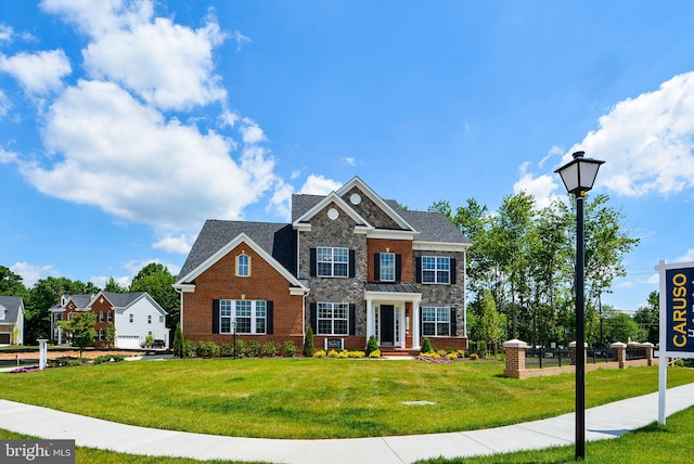 4420 Breidenbaugh Ln, Glen Arm, MD 21057 - colonial house with a front yard, brick siding, and stone siding