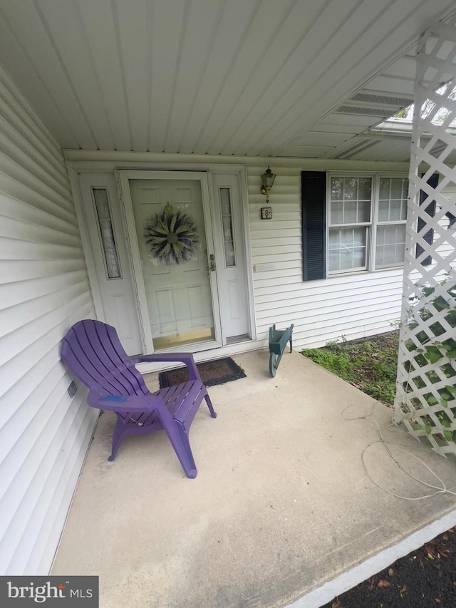 8 Cedar Rd, Mount Pocono, PA 18344 - doorway to property with a porch