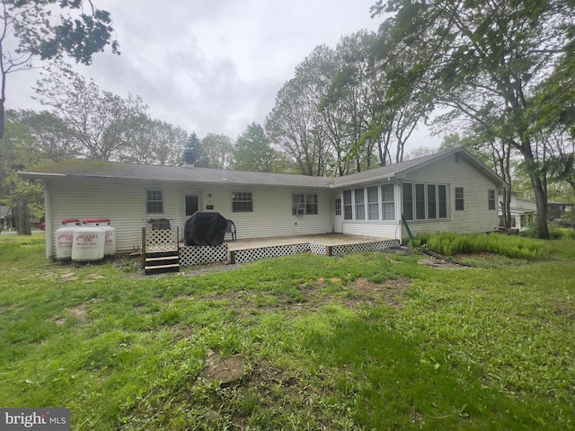 8 Cedar Rd, Mount Pocono, PA 18344 - back of house with a deck and a lawn