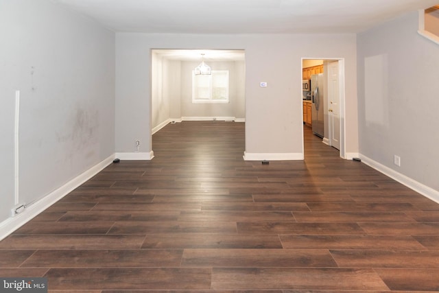 5603 Clearspring Rd, Baltimore, MD 21212 - spare room with dark wood-style floors and baseboards