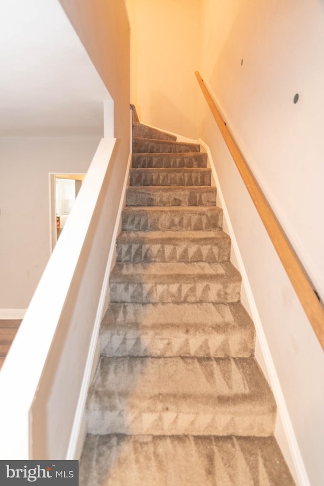 5603 Clearspring Rd, Baltimore, MD 21212 - staircase featuring carpet