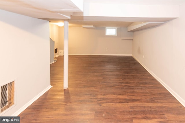 5603 Clearspring Rd, Baltimore, MD 21212 - basement featuring dark wood-style flooring and baseboards
