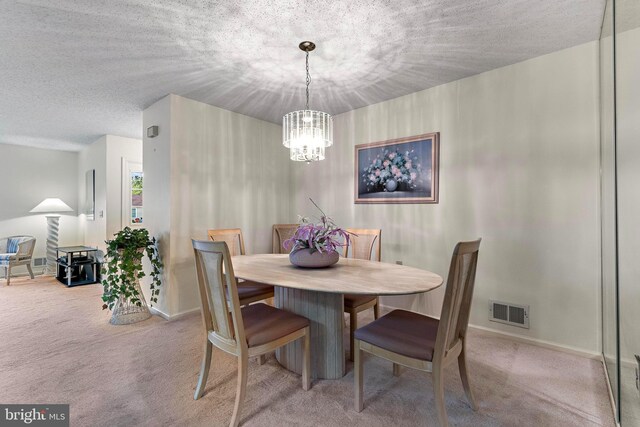 2 Cottonwood Dr, Barnegat, NJ 08005 - carpeted dining space featuring a chandelier and a textured ceiling