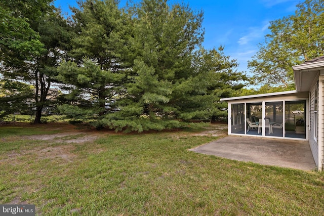 2 Cottonwood Dr, Barnegat, NJ 08005 - view of green lawn with a sunroom and a patio