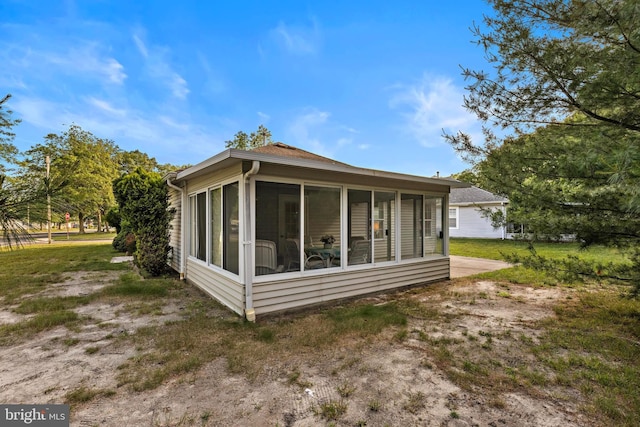 2 Cottonwood Dr, Barnegat, NJ 08005 - view of side of home with a sunroom