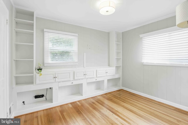 6937 Halleck St, District Heights, MD 20747 - mudroom featuring wood finished floors, wooden walls, and built in features